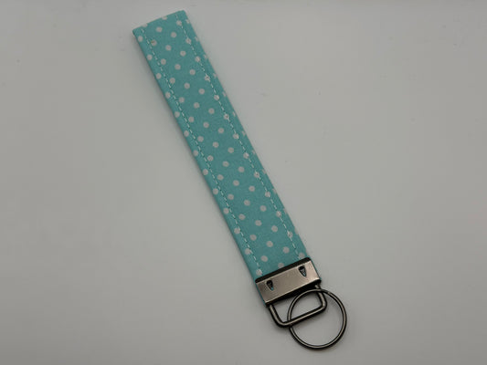 Light blue polka dot key fob wristlet with silver clasp and key ring